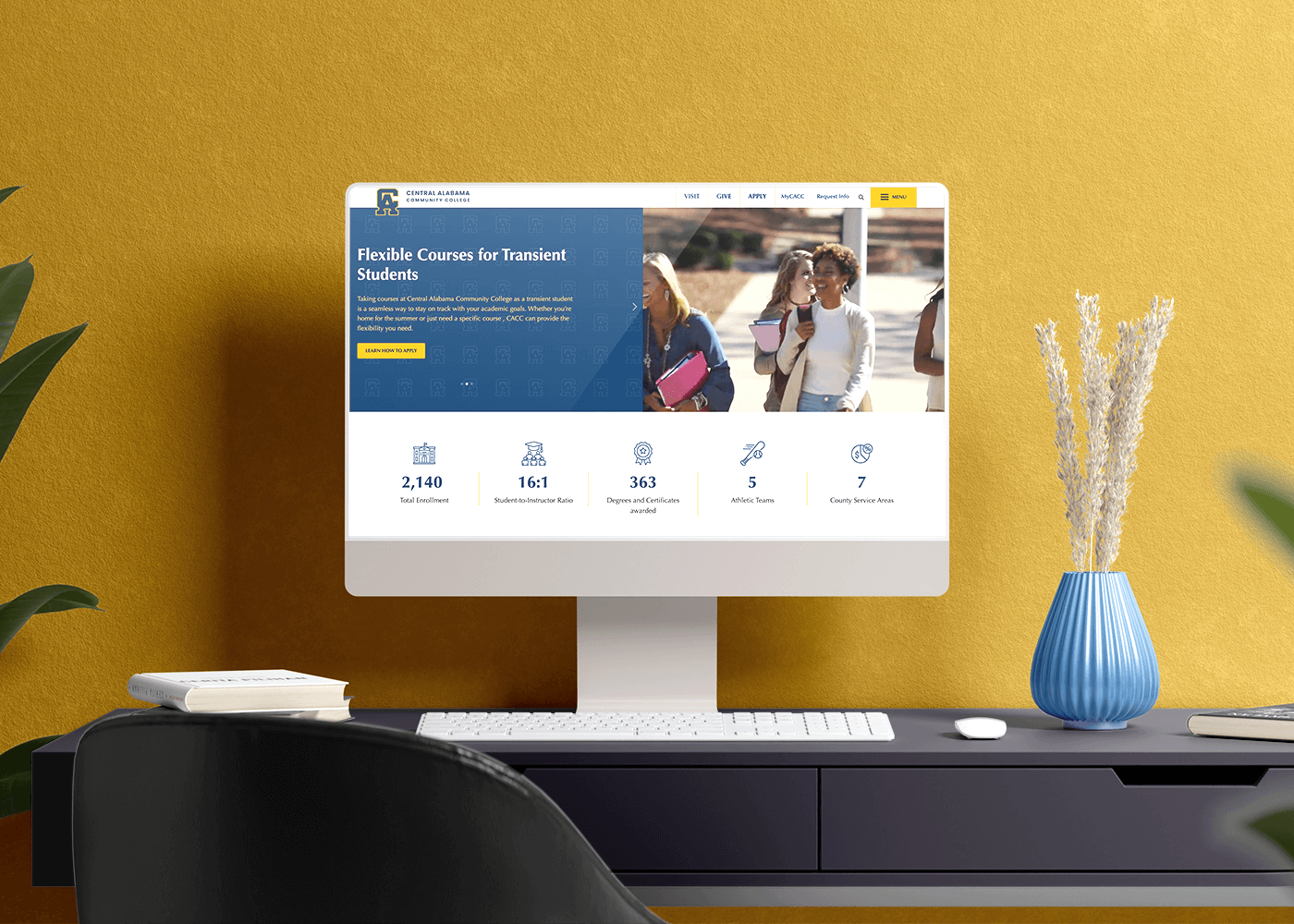 Desktop monitor displaying Central Alabama Community College homepage